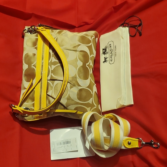 Coach Handbags - 💛💛  NWT Coach Poppy Slim  sunflower Crossbody ivory signature  Hippie  Purse